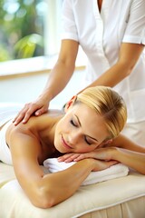 Obraz premium Woman Relaxing During Back Massage in Spa 
