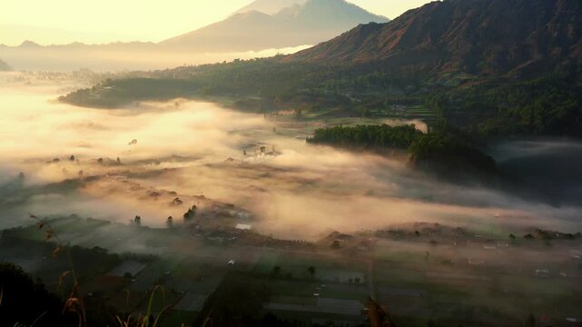 Pinggan Village Sunrise: Ethereal Morning Mist and Volcanic Vistas in Kintamani