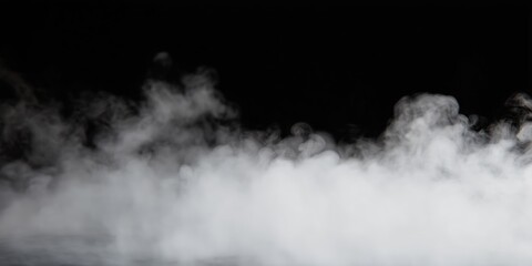 Fototapeta premium White fog and smoke on a black background with soft flowing texture and subtle movement.