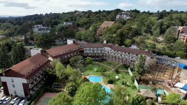Aerial drone view of hotel resort surrounded by trees in Gramado southern Brazil
