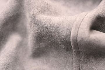 Fototapeta premium Grey Leather Jacket Texture — Creased Pure Leather Macro Close-Up with Soft Defocused Background