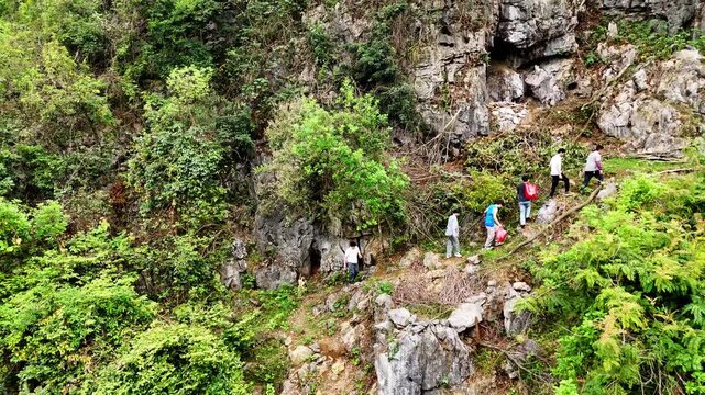  Drone Aerial of Guangxi Qingming Tradition, Hiking Through Dense Forest to Sweep Ancestral Grave 