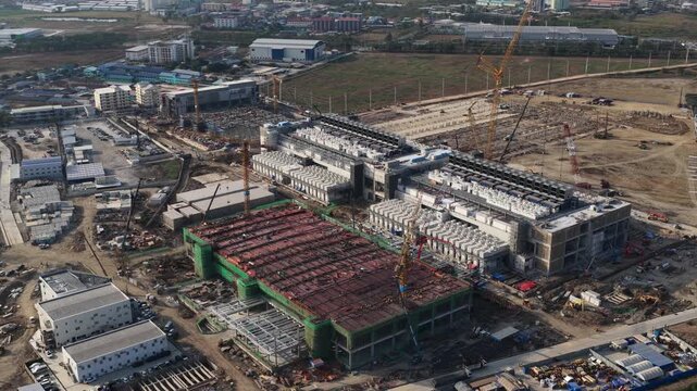 Aerial drone view of a data center under construction in Chonburi, Thailand, showcasing hyperscale AI infrastructure, cloud computing systems, and large scale IT technology development.