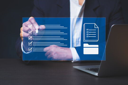 Business person using digital checklist interface on screen
