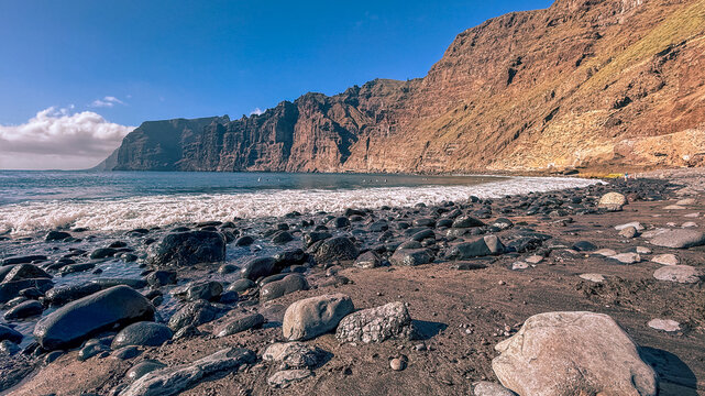 Playa de Los Guios Beach and Los Gigantes Cliffs in Tenerife, Canary Islands, Spain