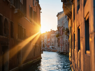Scenic narrow canal in Venice at sunset with golden hour light surrounded by traditional Italian architecture and old buildings