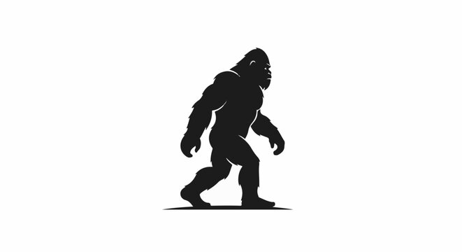Black silhouette of a furry, bipedal ape-like creature walking