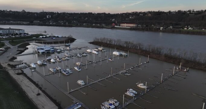 Aerial view of boats docked in a marina along the river with the opposite riverbank in the background, Dayton, Kentucky, United States.