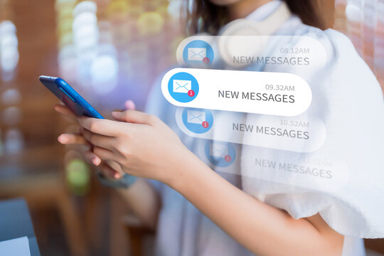Woman hand holding smartphone checks new message notifications on screen for instant communication social network and email updates notification online chat technology