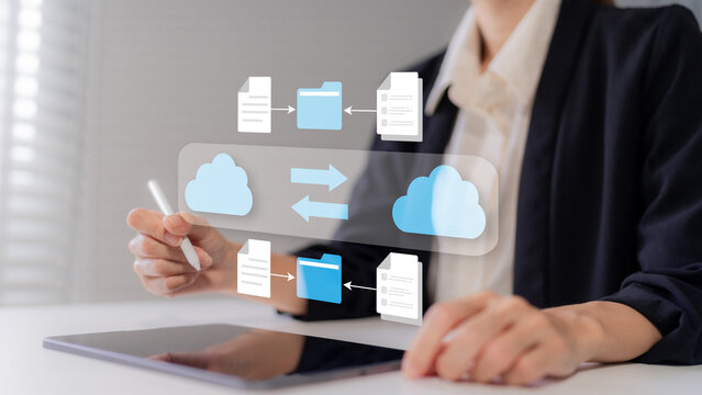 Businesswoman with cloud computing technology for secure data transfer document management online file sharing storage backup Cloud Computing Data Management System