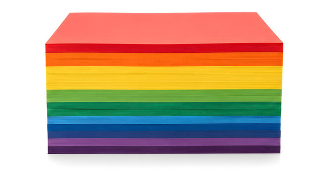 A stack of rainbow-colored paper sheets forming a cube on a white background