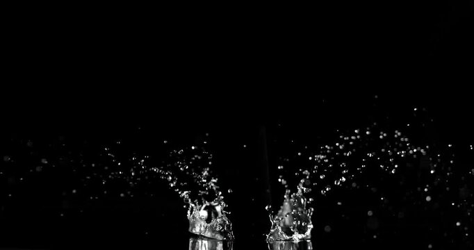 Super slow motion (1000 fps) crown splash of water with hollow black center, isolated on black background. Perfect VFX overlay for product placement, clean cinematic liquid impact.