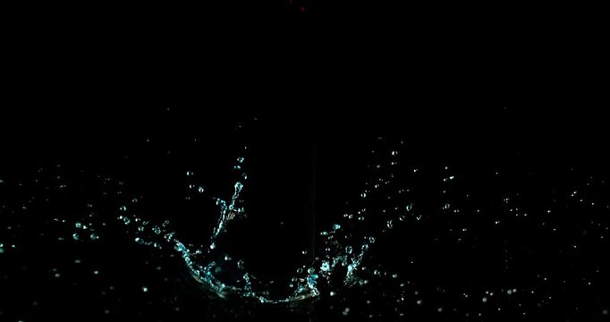 Super slow motion (1000 fps) crown splash of water with hollow black center, isolated on black background. Perfect VFX overlay for product placement, clean cinematic liquid impact.