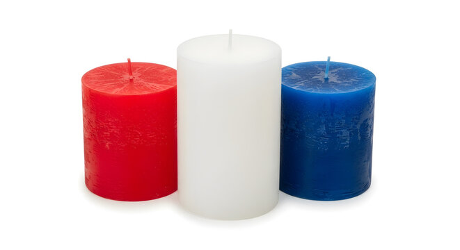 Three colorful candles in red, white, and blue standing upright on a plain background