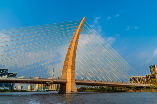 A view at sunset towards the Ba Son bridge in Ho Chi Minh City. Vietnam on bright spring evening