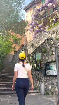 Woman Walking POV on Sentiero di Gandria Lugano, Scenic Olive Trail by Lake, Travel Lifestyle Nature Experience in Switzerland