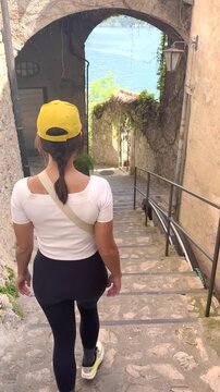 Woman Walking POV on Sentiero di Gandria Lugano, Scenic Olive Trail by Lake, Travel Lifestyle Nature Experience in Switzerland