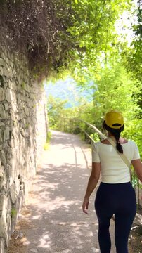 Woman Walking POV on Sentiero di Gandria Lugano, Scenic Olive Trail by Lake, Travel Lifestyle Nature Experience in Switzerland