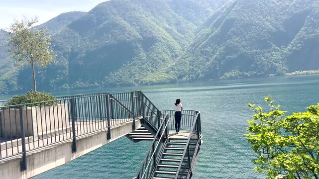 Woman Walking POV on Sentiero di Gandria Lugano, Scenic Olive Trail by Lake, Travel Lifestyle Nature Experience in Switzerland