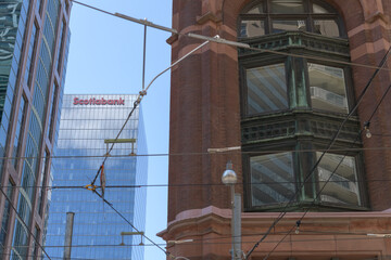 Naklejka premium looking west on Richmond St E from Victoria St with view of Scotiabank skyline sign at Bay Adelaide Centre, Toronto