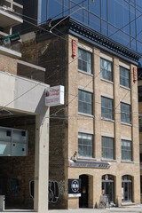 Obraz premium exterior building facade and sign of Yakiniku Legend, a restaurant, located at 35 McCaul St, Toronto (near Village by the Grange)
