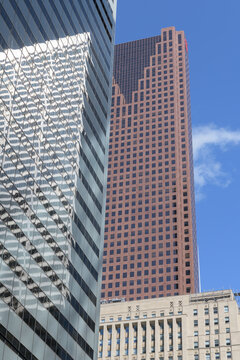 financial district looking east to First Canadian Place, location of BMO, Bank of Montreal, headquarters, Scotia Plaza and the old Bank of Nova Scotia (Commerce Court West reflection), Toronto