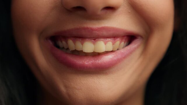 Extreme close up female mouth smiling with white teeth lips skin care procedure oral health beauty unrecognizable woman smile toothy dental medicine whitening clinic girl unknown lady face cheerful