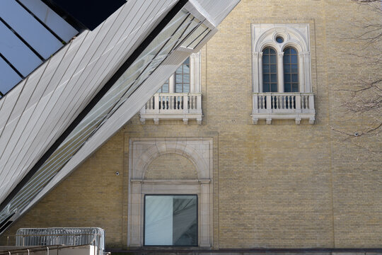 exterior of the Royal Ontario Museum on Bloor St W; showing the 1914 Neo-Romanesque yellow brick facade "sliced" by Daniel Libeskind&rsquo;s 2007 Crystal, Toronto