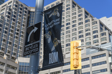 Naklejka premium pole mounted banner advertising ROM exhibit on bees (looking northeast from Bloor St W and Queens Park), Toronto