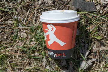 Naklejka premium discarded beverage cup of The Daily Perk Coffee Co, a coffee shop (located at Victoria Park Subway Station, 777 Victoria Park Av), Toronto
