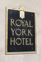 Naklejka premium Royal York Hotel sign mounted to the stone wall, southwest corner at York St and Front St W, Toronto