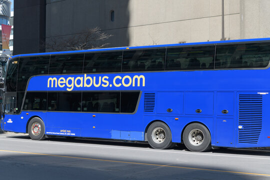 megabus dot com vehicle standing on Yonge St near Queens Quay, Toronto