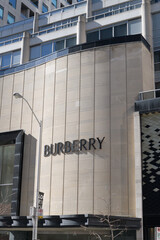 Obraz premium exterior building and heritage facade (former University Theatre) with sign of Burberry, a clothing store, located at 100 Bloor St W, Toronto