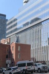 Naklejka premium TargetPark, a parking lot, located at 217 Adelaide St W, seen here from Pearl St with contemporary mixed use building (Thomson Reuters), Toronto