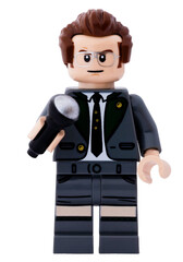 Naklejka premium Dortmund - Deutschland 15. April 2026 - Lego Minifigur Mann mit einem Mikrofon in der Hand