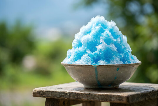 Blue Hawaii kakigori shaved ice bowl on a wooden stool with a lush summer garden background.