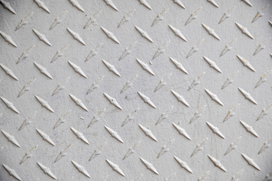 White metal diamond plate texture background.