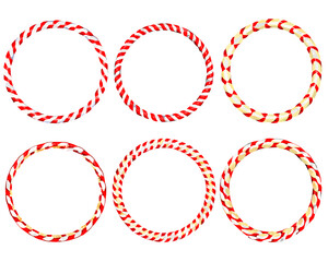 Six colorful hula hoops arranged against a stark black background © MihirKumarMondal