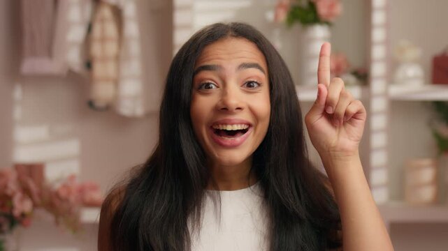 Close up thoughtful Hispanic girl find solution Latina woman thinking come up with idea happy smiling finding insight American ethnic female think hesitate skin care beauty routine in pink bathroom