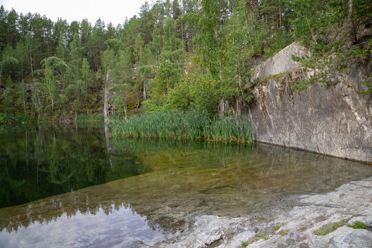Fragment of the shore of the picturesque Talkov Kamen lake. Bazhov Places Nature Park, Sverdlovsk Region, Russia