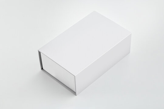 An image of a White Paper Box isolated on a white background. Box mockup isolated