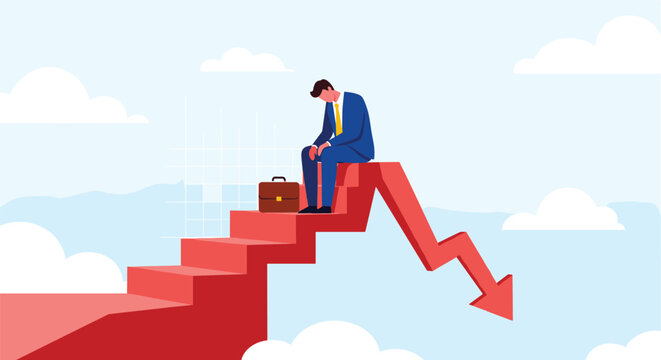 Sad businessman sits on the edge of a falling red arrow graph against a cloudy blue sky symbolizing financial loss or failure.