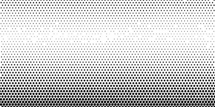 Gradual halftone dot pattern transitioning from dense to sparse distribution