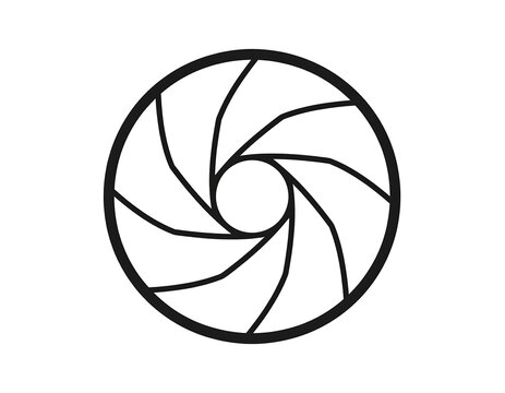 Black and white illustration of a camera lens aperture. The blades form a circular shape with a central hole