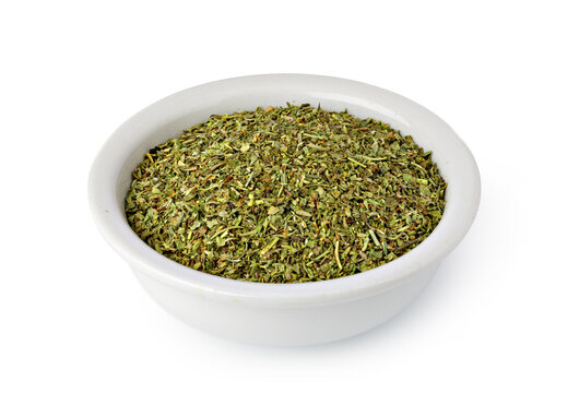 Dried oregano herbs in white bowl for seasoning food