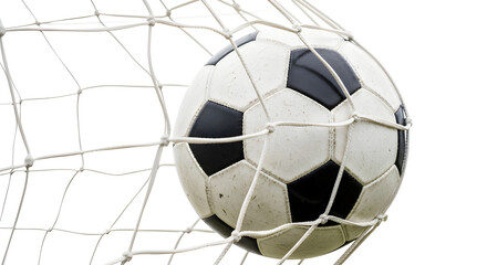 Fototapeta premium A soccer ball caught in a goal net after a successful shot, capturing the thrill of the game