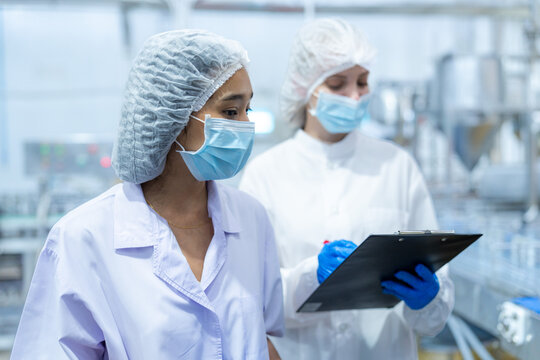 Food and manufacturing researchers oversee seafood production lines in tightly controlled factories where machinery is used to produce and cook food before it is shipped out.