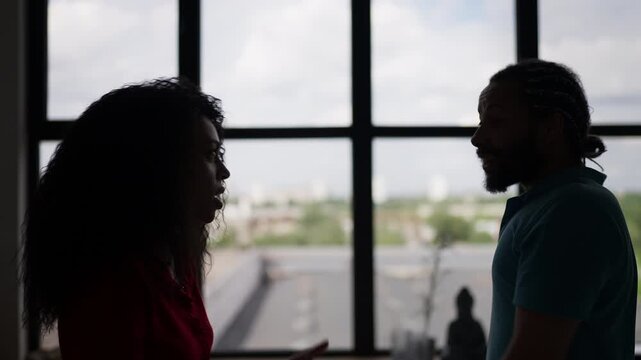 Upset Black woman arguing with her boyfriend at home, relationship conflict