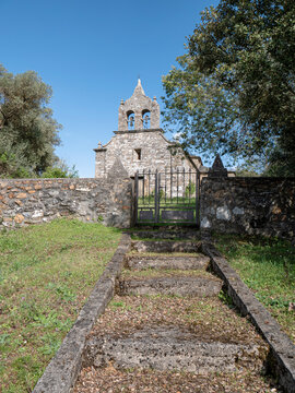 Stone steps lead to a metal gate that, along with a stone wall, protects the Hermitage of Our Lady of the Star, located in the town of San Juan de Paluezas, in El Bierzo
