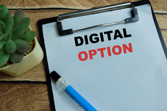 Concept of digital option write on clipboard isolated on Wooden Table.